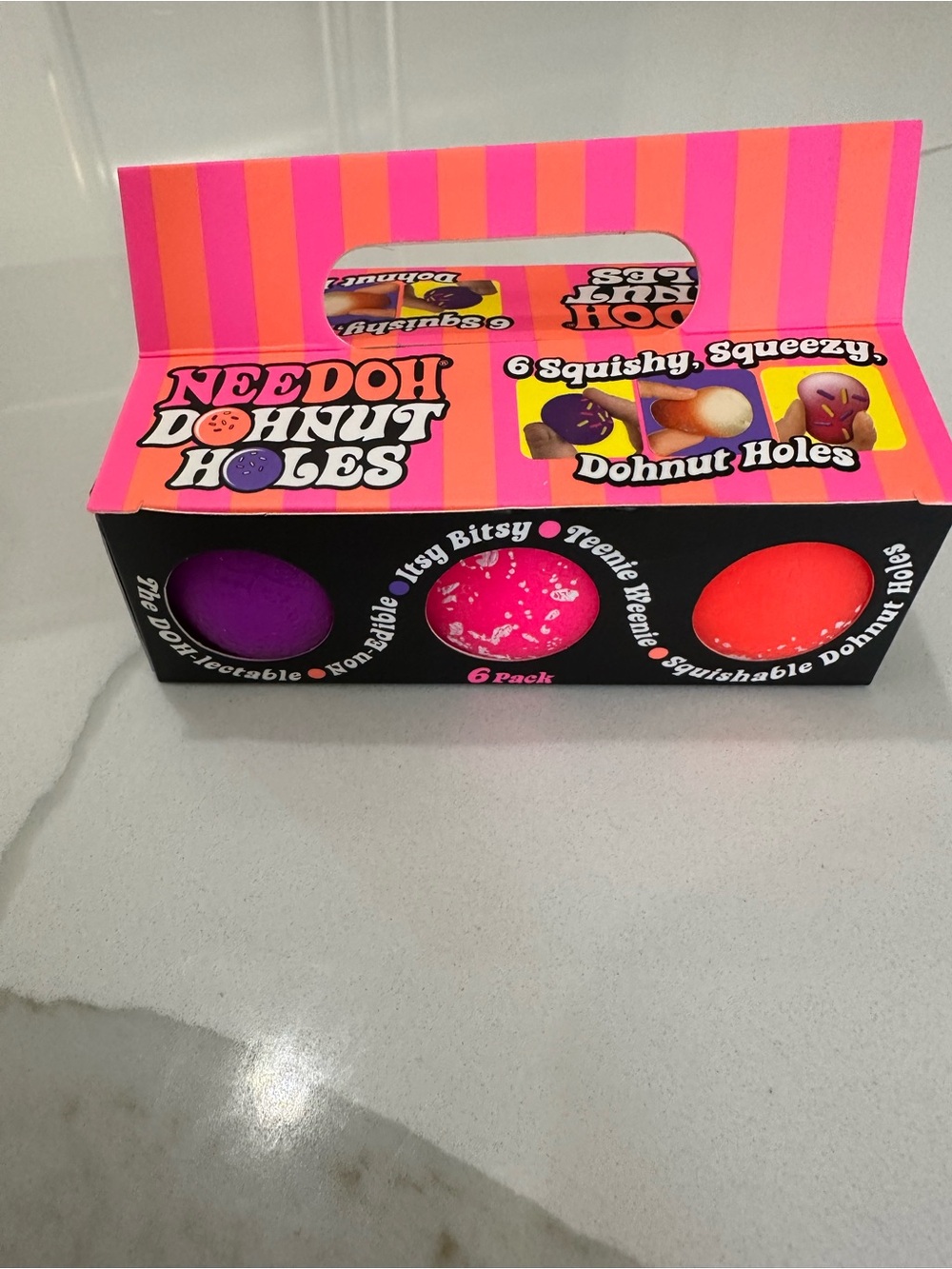 6 pack NeeDoh Teenie Dohnut Holes itsy-bitsy donut holes in a cute 6 pack box